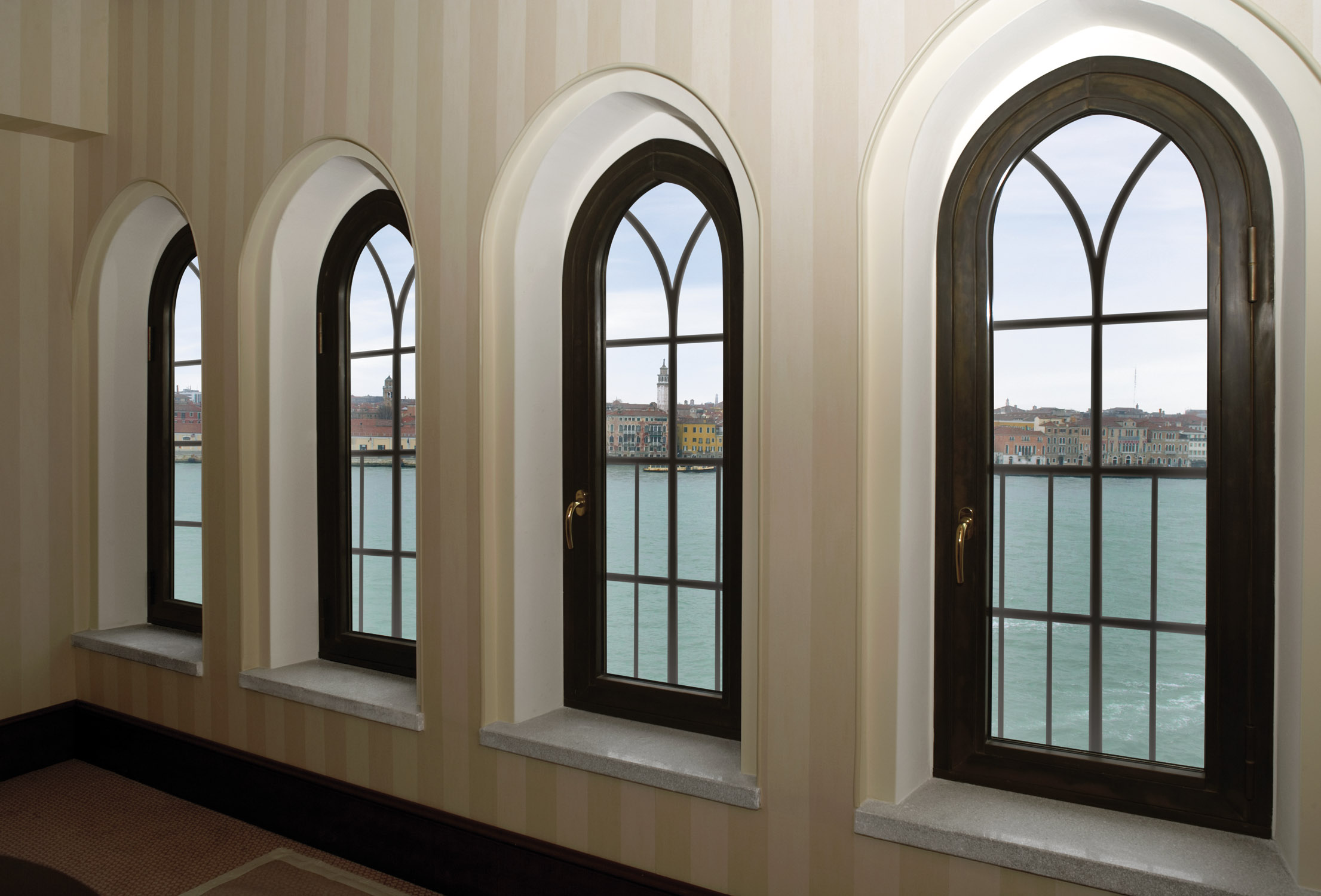 BRONZE WINDOWS AND DOORSSTRENGTH AND BEAUTY COMBINED Steel Windows and Doors